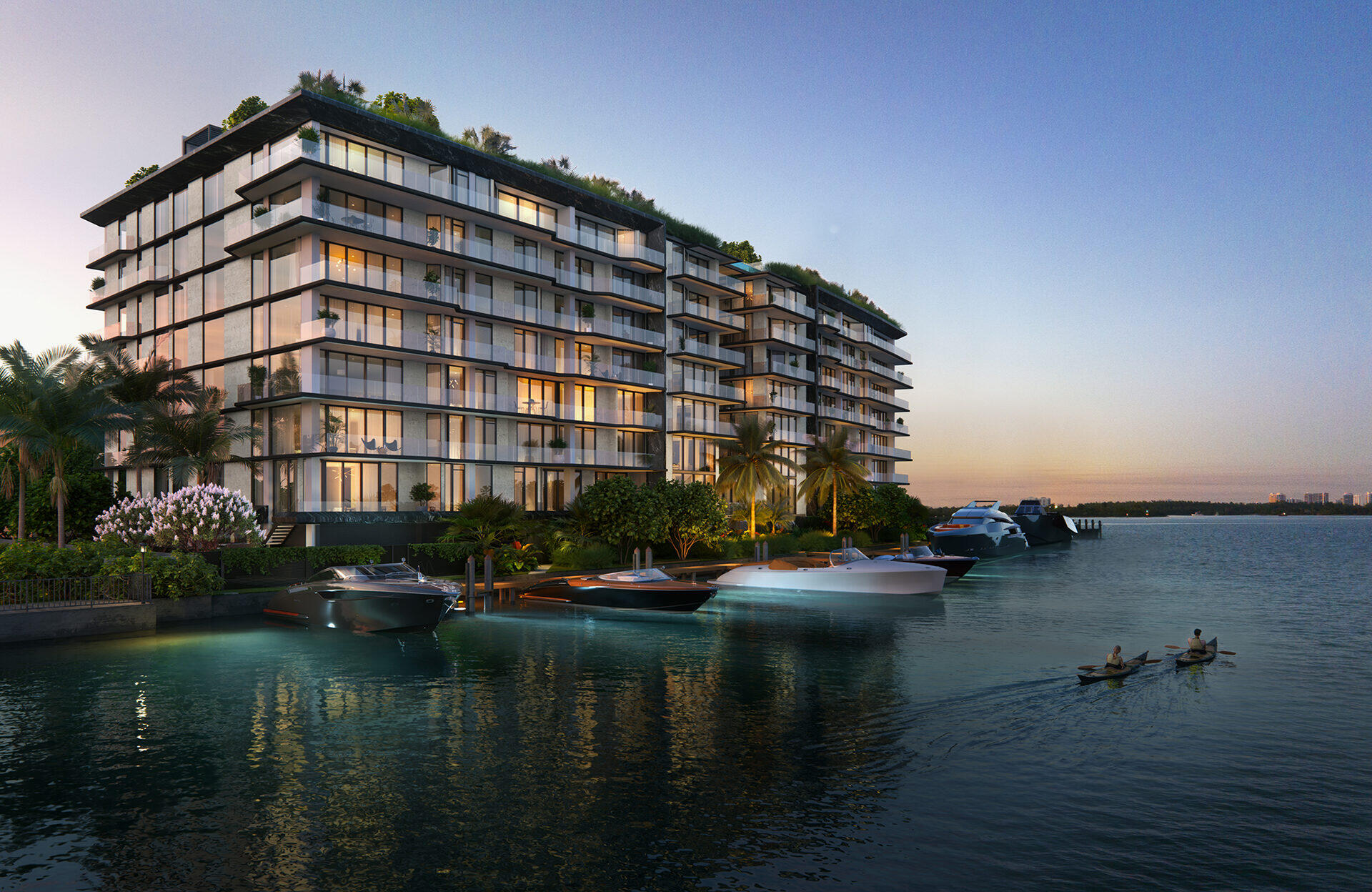 Bay Harbor Towers, the waterfront elevation at dusk with terraces and docked boats, developer rendering