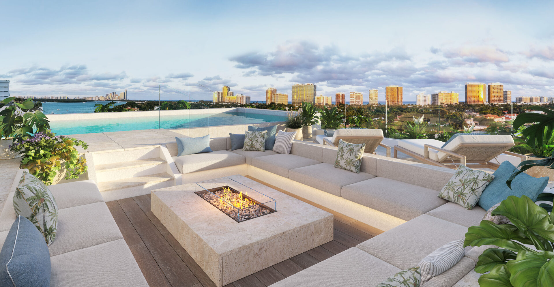 Penthouse rooftop with infinity pool, firepit lounge and sunset skyline view